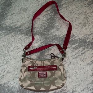 Coach tan shoulder bag with red straps